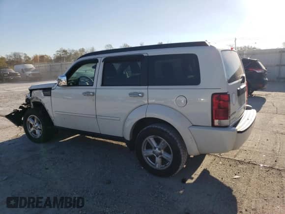 2007 Dodge Nitro SXT с VIN 1D8GU28K37W729848, выставлен на аукционе Copart как лот 77415264 с пробегом 247 756 миль миль и Списание • Salvage title. История ставок и продаж доступна на DreamBid. Изображение 2.
