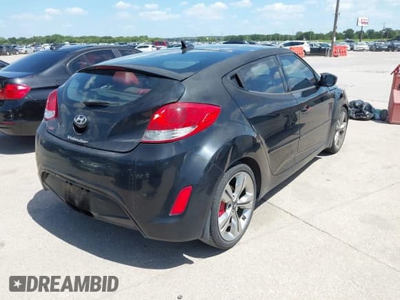 ✅ 2012 Hyundai Veloster w/Gray Int • VIN: KMHTC6AD2CU077454 • Лот: 42843435. Опубликован ранее на IAAI с пробегом 144 876 миль. Бесплатный доступ к архиву аукционных продаж из США и подробный отчёт об истории автомобиля на DreamBid. Изображение 4.