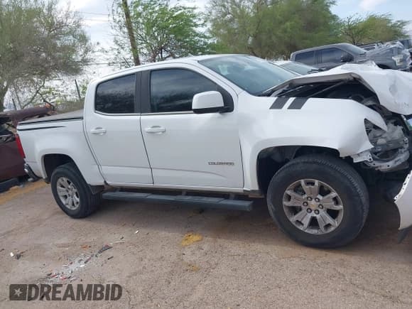 ✅ 2020 Chevrolet Colorado 2WD LT • VIN: 1GCGSCEN0L1124654 • Lot: 42248002. Listed on IAAI with 76,223 mi. Free auction sales archive from the USA and detailed vehicle history report at DreamBid. Image 13.