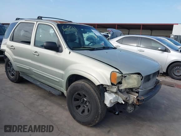 ✅ 2003 Ford Escape Limited • VIN: 1FMCU94103KD47888 • Lot: 42644120. Listed on IAAI with 247,024 mi. Free auction sales archive from the USA and detailed vehicle history report at DreamBid. Image 1.