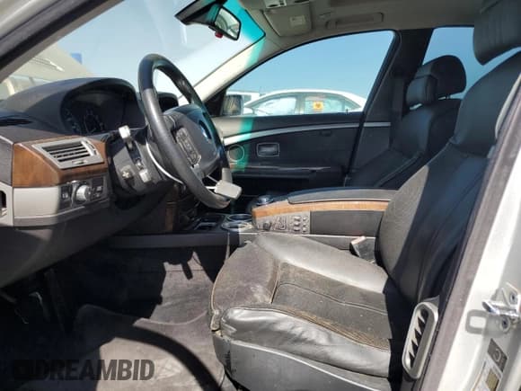 ✅ 2006 BMW 7 Series 750i • VIN: WBAHL83566DT03671 • Lot: 64324505. Listed on Copart with 154,418 mi. Free auction sales archive from the USA and detailed vehicle history report at DreamBid. Image 7.