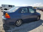 ✅ 2002 Suzuki Aerio S • VIN: JS2RA41S225109275 • Lot: 52689585. Wystawiony na Copart z przebiegiem 195 612 mil. Bezpłatny archiwum sprzedaży aukcyjnych z USA i szczegółowy raport historii pojazdu na DreamBid. Zdjęcie 3.