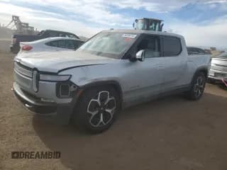 ✅ 2022 Rivian R1T Adventure • VIN: 7FCTGAAA4NN014462 • Lot: 85599714. Listed on Copart with 28,790 mi. Free auction sales archive from the USA and detailed vehicle history report at DreamBid. Image 1.