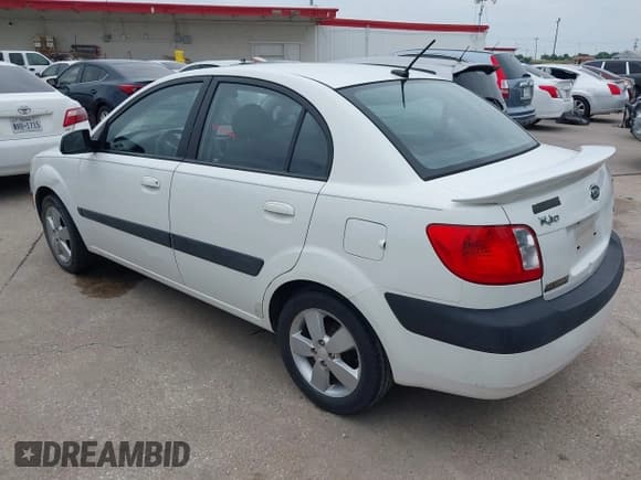 ✅ 2009 Kia Rio LX • VIN: KNADE223096557455 • Lot: 42432576. Listed on IAAI with 155,523 mi. Free auction sales archive from the USA and detailed vehicle history report at DreamBid. Image 3.