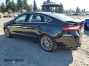 ✅ 2015 Ford Fusion Titanium • VIN: 3FA6P0D97FR161457 • Lot: 82297095. Listed on Copart with 65,565 mi. Free auction sales archive from the USA and detailed vehicle history report at DreamBid. Image 2.