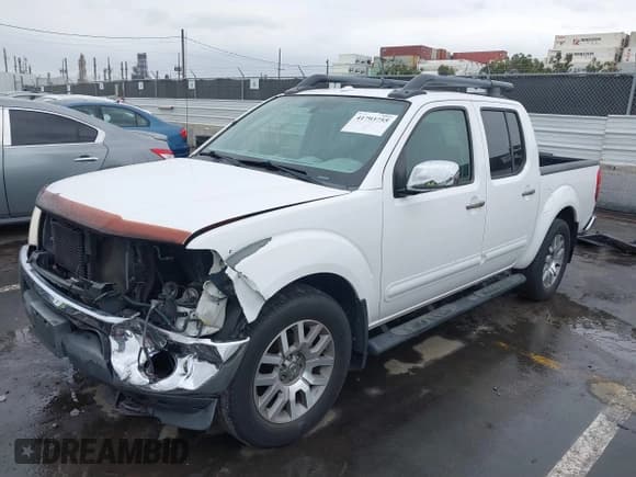 ✅ 2010 Nissan Frontier SE • VIN: 1N6AD0ER0AC435548 • Lot: 41793755. Wystawiony na IAAI z przebiegiem 126 934 mil. Bezpłatny archiwum sprzedaży aukcyjnych z USA i szczegółowy raport historii pojazdu na DreamBid. Zdjęcie 2.