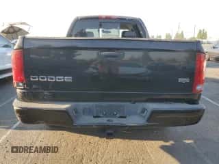 2004 Dodge 1500 SLT z VIN 1D7HA18D04J166733, wystawiony jako Copart lot #70721514 z przebiegiem 169 338 mil mil oraz Szkoda całkowita • Salvage title. Historia ofert i sprzedaży dostępna na DreamBid. Obrazek 6.