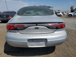 ✅ 1999 Ford Taurus SE • VIN: 1FAFP53U6XG153295 • Лот: 63790164. Опубликован ранее на Copart с пробегом 128 436 миль. Бесплатный доступ к архиву аукционных продаж из США и подробный отчёт об истории автомобиля на DreamBid. Изображение 6.