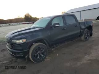 2020 Ram 1500 Limited with VIN 1C6SRFHTXLN409573, listed as a Copart auction lot 90011935 with 57,362 mi miles and Salvage title. Bid and sale history available at DreamBid. Image 1.