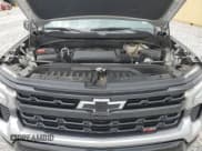✅ 2022 Chevrolet Silverado 1500 LT Trail Boss • VIN: 3GCUDFED8NG596000 • Lot: 71113755. Wystawiony na Copart z przebiegiem 14 037 mil. Bezpłatny archiwum sprzedaży aukcyjnych z USA i szczegółowy raport historii pojazdu na DreamBid. Zdjęcie 11.