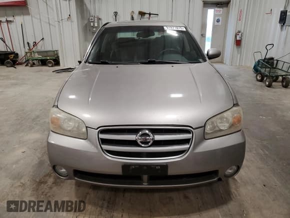 ✅ 2003 Nissan Maxima GLE • VIN: JN1DA31A23T408738 • Лот: 91971815. Опубликован ранее на Copart с пробегом 134 856 миль. Бесплатный доступ к архиву аукционных продаж из США и подробный отчёт об истории автомобиля на DreamBid. Изображение 5.