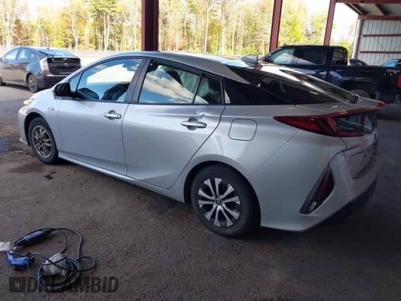 2021 Toyota Prius Limited z VIN JTDKAMFP9M3187986, wystawiony jako IAAI lot #43398563 z przebiegiem 38 772 mil mil oraz . Historia ofert i sprzedaży dostępna na DreamBid. Obrazek 3.