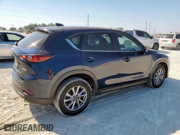 ✅ 2023 Mazda CX-5 S Preferred • VIN: JM3KFBCM8P0169606 • Lot: 85891735. Listed on Copart with 70,494 mi. Free auction sales archive from the USA and detailed vehicle history report at DreamBid. Image 3.