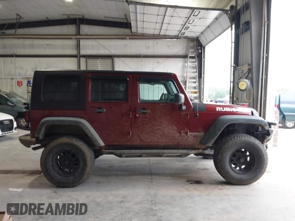 ✅ 2008 Jeep Wrangler Rubicon • VIN: 1J8GA69178L630840 • Lot: 42483010. Listed on IAAI with 145,196 mi. Free auction sales archive from the USA and detailed vehicle history report at DreamBid. Image 14.
