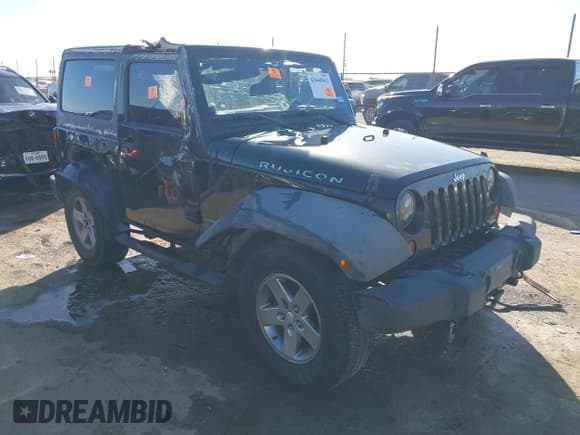 ✅ 2012 Jeep Wrangler Rubicon • VIN: 1C4BJWCG2CL100492 • Lot: 43660963. Listed on IAAI with 112,773 mi. Free auction sales archive from the USA and detailed vehicle history report at DreamBid. Image 1.