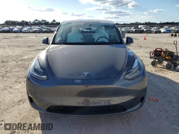 ✅ 2022 Tesla Model Y Performance • VIN: 7SAYGDEFXNF517160 • Lot: 92797085. Listed on Copart with 26,777 mi. Free auction sales archive from the USA and detailed vehicle history report at DreamBid. Image 5.
