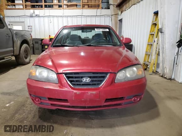 2004 Hyundai Elantra GLS with VIN KMHDN46D14U711429, listed as a Copart auction lot 85075885 with 92,027 mi miles and Salvage title. Bid and sale history available at DreamBid. Image 5.