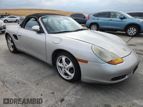 ✅ 1997 Porsche Boxster • VIN: WP0CA2983VS622053 • Lot: 70346355. Listed on Copart with 169,872 mi. Free auction sales archive from the USA and detailed vehicle history report at DreamBid. Image 4.
