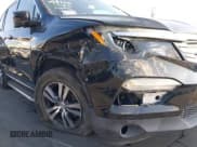 ✅ 2017 Honda Pilot EX-L • VIN: 5FNYF5H76HB009198 • Lot: 41360761. Listed on IAAI with 108,719 mi. Free auction sales archive from the USA and detailed vehicle history report at DreamBid. Image 6.