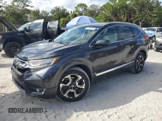✅ 2019 Honda CR-V Touring • VIN: 7FARW1H92KE004297 • Lot: 91552195. Wystawiony na Copart z przebiegiem 26 435 mil. Bezpłatny archiwum sprzedaży aukcyjnych z USA i szczegółowy raport historii pojazdu na DreamBid. Zdjęcie 1.