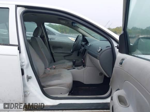 2007 Chevrolet Cobalt LS z VIN 1G1AK55F577310244, wystawiony jako IAAI lot #43147736 z przebiegiem 169 761 mil mil oraz . Historia ofert i sprzedaży dostępna na DreamBid. Obrazek 5.