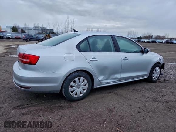 ✅ 2015 Volkswagen Jetta S • VIN: 3VW2K7AJ8FM426427 • Лот: 94433195. Опубликован ранее на Copart с пробегом 106 251 миль. Бесплатный доступ к архиву аукционных продаж из США и подробный отчёт об истории автомобиля на DreamBid. Изображение 3.