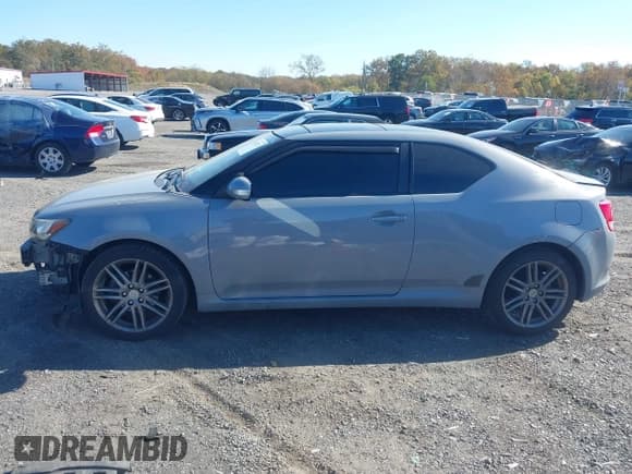 ✅ 2013 Scion tC • VIN: JTKJF5C79D3062499 • Lot: 43523715. Wystawiony na IAAI z przebiegiem 144 340 mil. Bezpłatny archiwum sprzedaży aukcyjnych z USA i szczegółowy raport historii pojazdu na DreamBid. Zdjęcie 14.