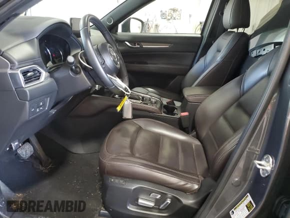 ✅ 2023 Mazda CX-5 Signature • VIN: JM3KFBXY6P0291619 • Lot: 70185145. Listed on Copart with 34,981 mi. Free auction sales archive from the USA and detailed vehicle history report at DreamBid. Image 7.