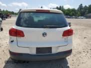 ✅ 2013 Volkswagen Tiguan SE • VIN: WVGBV7AX7DW519222 • Lot: 66412745. Listed on Copart with 212,404 mi. Free auction sales archive from the USA and detailed vehicle history report at DreamBid. Image 6.