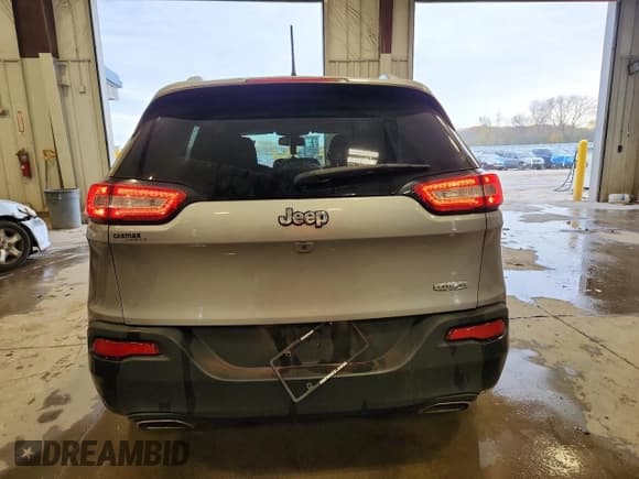 ✅ 2018 Jeep Cherokee Latitude • VIN: 1C4PJLCX2JD531295 • Lot: 90928455. Listed on Copart with 56,852 mi. Free auction sales archive from the USA and detailed vehicle history report at DreamBid. Image 6.
