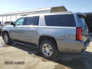 ✅ 2019 Chevrolet Suburban LS • VIN: 1GNSCGKC6KR209877 • Lot: 77125534. Wystawiony na Copart z przebiegiem 67 591 mil. Bezpłatny archiwum sprzedaży aukcyjnych z USA i szczegółowy raport historii pojazdu na DreamBid. Zdjęcie 2.