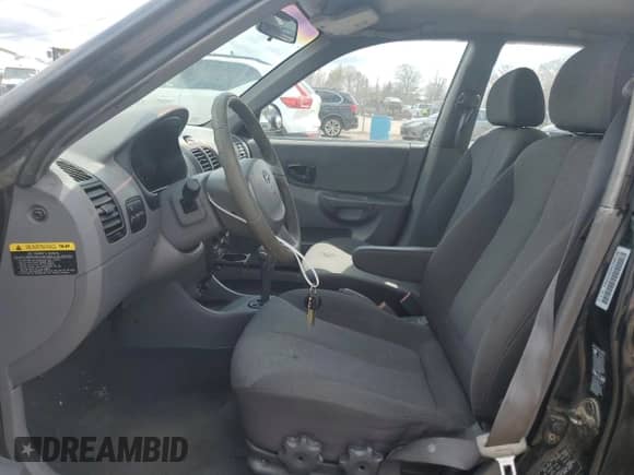 2004 Hyundai Accent GL с VIN KMHCG45C04U506196, выставлен на аукционе Copart как лот 51276195 с пробегом 75 550 миль миль и Чистый • Clean title. История ставок и продаж доступна на DreamBid. Изображение 7.