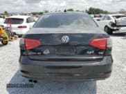 ✅ 2015 Volkswagen Jetta SE • VIN: 3VWD17AJ1FM238876 • Lot: 58957215. Listed on Copart with 122,705 mi. Free auction sales archive from the USA and detailed vehicle history report at DreamBid. Image 6.