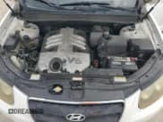 ✅ 2007 Hyundai Santa Fe SE • VIN: 5NMSH13E97H086658 • Лот: 85554975. Опубликован ранее на Copart с пробегом 187 517 миль. Бесплатный доступ к архиву аукционных продаж из США и подробный отчёт об истории автомобиля на DreamBid. Изображение 12.