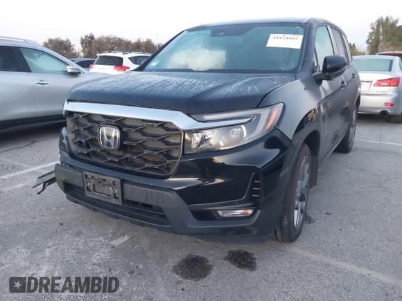 ✅ 2022 Honda Passport EX-L • VIN: 5FNYF7H53NB005762 • Lot: 41824602. Listed on IAAI with 28,104 mi. Free auction sales archive from the USA and detailed vehicle history report at DreamBid. Image 2.