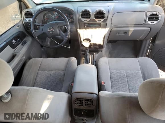 ✅ 2005 GMC Envoy SLE • VIN: 1GKDT13S052353396 • Лот: 81951675. Опубликован ранее на Copart с пробегом 201 709 миль. Бесплатный доступ к архиву аукционных продаж из США и подробный отчёт об истории автомобиля на DreamBid. Изображение 8.