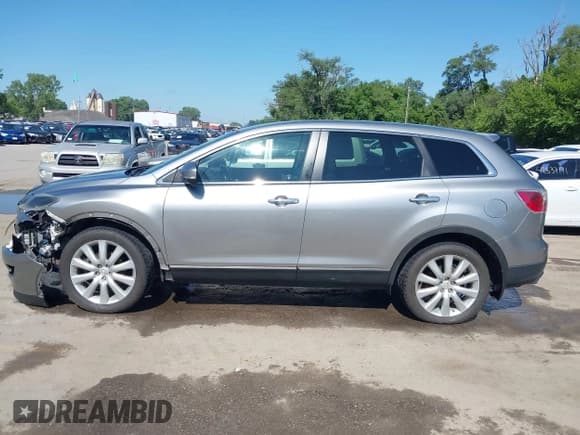 ✅ 2010 Mazda CX-9 Grand Touring • VIN: JM3TB3MA7A0231370 • Лот: 42526235. Опубликован ранее на IAAI с пробегом 164 794 миль. Бесплатный доступ к архиву аукционных продаж из США и подробный отчёт об истории автомобиля на DreamBid. Изображение 14.
