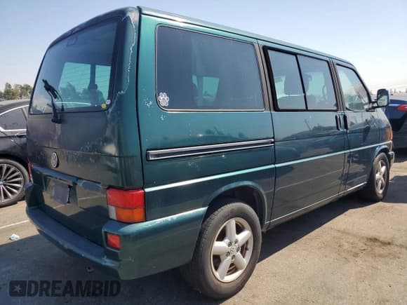 ✅ 2003 Volkswagen EuroVan GLS • VIN: WV2KB47043H001319 • Lot: 73758024. Listed on Copart with 88,497 mi. Free auction sales archive from the USA and detailed vehicle history report at DreamBid. Image 3.