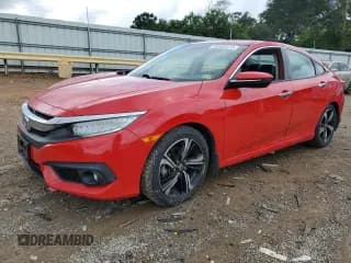 ✅ 2017 Honda Civic Touring • VIN: 2HGFC1F90HH656589 • Lot: 68885575. Listed on Copart with 42,266 mi. Free auction sales archive from the USA and detailed vehicle history report at DreamBid. Image 1.