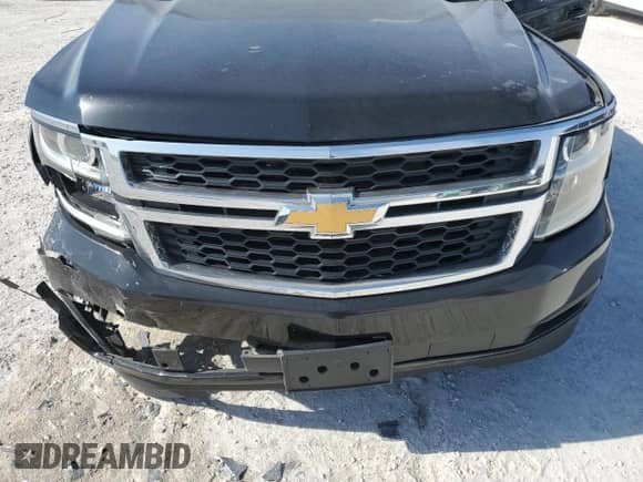 2018 Chevrolet Suburban LS z VIN 1GNSCGKC6JR233403, wystawiony jako Copart lot #41522755 z przebiegiem Nie podano mil oraz Szkoda całkowita • Salvage title. Historia ofert i sprzedaży dostępna na DreamBid. Obrazek 12.