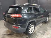 ✅ 2014 Jeep Cherokee Altitude • VIN: 1C4PJMCS0EW220176 • Lot: 42162678. Listed on IAAI with 127,370 mi. Free auction sales archive from the USA and detailed vehicle history report at DreamBid. Image 4.