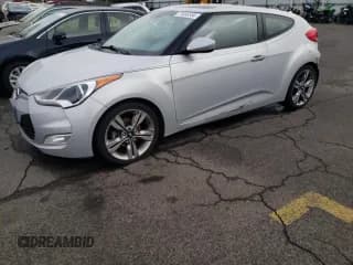 ✅ 2017 Hyundai Veloster • VIN: KMHTC6AD2HU321868 • Lot: 79083584. Wystawiony na Copart z przebiegiem 105 528 mil. Bezpłatny archiwum sprzedaży aukcyjnych z USA i szczegółowy raport historii pojazdu na DreamBid. Zdjęcie 1.
