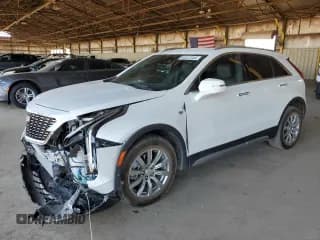 ✅ 2022 Cadillac XT4 FWD Premium Luxury • VIN: 1GYFZCR46NF129687 • Lot: 64337245. Listed on Copart with 29,412 mi. Free auction sales archive from the USA and detailed vehicle history report at DreamBid. Image 1.