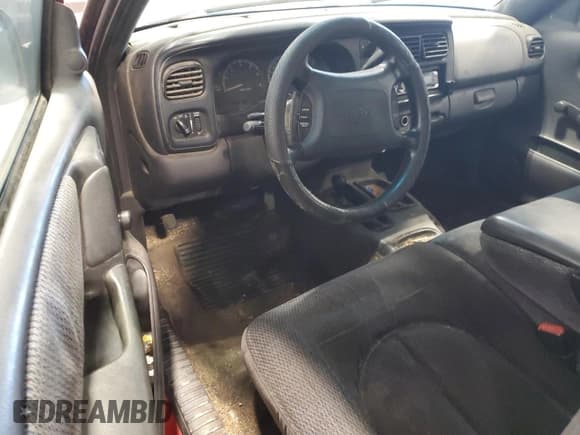 ✅ 1999 Dodge Dakota SLT • VIN: 1B7GG22X1XS295947 • Lot: 82611714. Wystawiony na Copart z przebiegiem Nie podano. Bezpłatny archiwum sprzedaży aukcyjnych z USA i szczegółowy raport historii pojazdu na DreamBid. Zdjęcie 8.