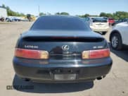 ✅ 1997 Lexus SC 400 • VIN: JT8CH32Y6V0052491 • Lot: 59202095. Wystawiony na Copart z przebiegiem 160 656 mil. Bezpłatny archiwum sprzedaży aukcyjnych z USA i szczegółowy raport historii pojazdu na DreamBid. Zdjęcie 6.