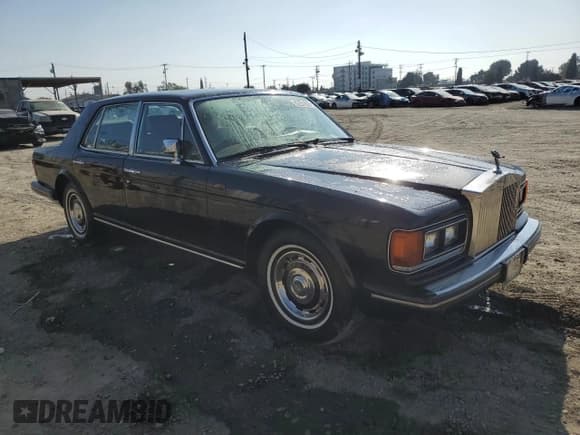 ✅ 1986 Rolls-Royce Silver Spirit • VIN: SCAZS42A9GCX14174 • Lot: 82251525. Listed on Copart with 95,115 mi. Free auction sales archive from the USA and detailed vehicle history report at DreamBid. Image 4.