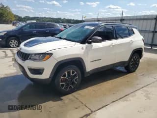 ✅ 2019 Jeep Compass Trailhawk • VIN: 3C4NJDDB3KT617999 • Lot: 71472655. Listed on Copart with 102,850 mi. Free auction sales archive from the USA and detailed vehicle history report at DreamBid. Image 1.