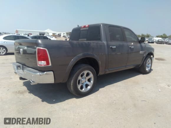 ✅ 2015 Ram 1500 Laramie • VIN: 1C6RR6NM0FS590636 • Lot: 37320388. Wystawiony na IAAI z przebiegiem 93 163 mil. Bezpłatny archiwum sprzedaży aukcyjnych z USA i szczegółowy raport historii pojazdu na DreamBid. Zdjęcie 4.