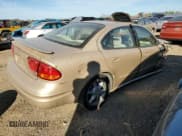 ✅ 2001 Oldsmobile Alero GL2 • VIN: 1G3NL52E71C136922 • Lot: 73540794. Listed on Copart with 69,703 mi. Free auction sales archive from the USA and detailed vehicle history report at DreamBid. Image 3.