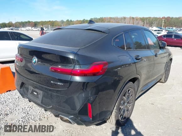 ✅ 2023 BMW X4 xDrive30i • VIN: 5UX33DT01P9P53175 • Lot: 43686317. Listed on IAAI with 31,674 mi. Free auction sales archive from the USA and detailed vehicle history report at DreamBid. Image 4.